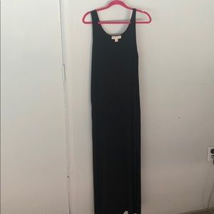 Black dress-ankle length; knee high slits.